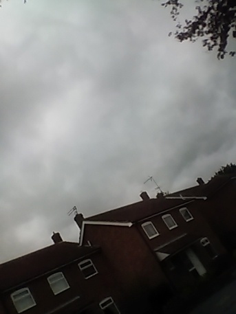 Leaden skies .....and no the wind hasn't blown the houses sideways ....though it was very nearly strong enough !